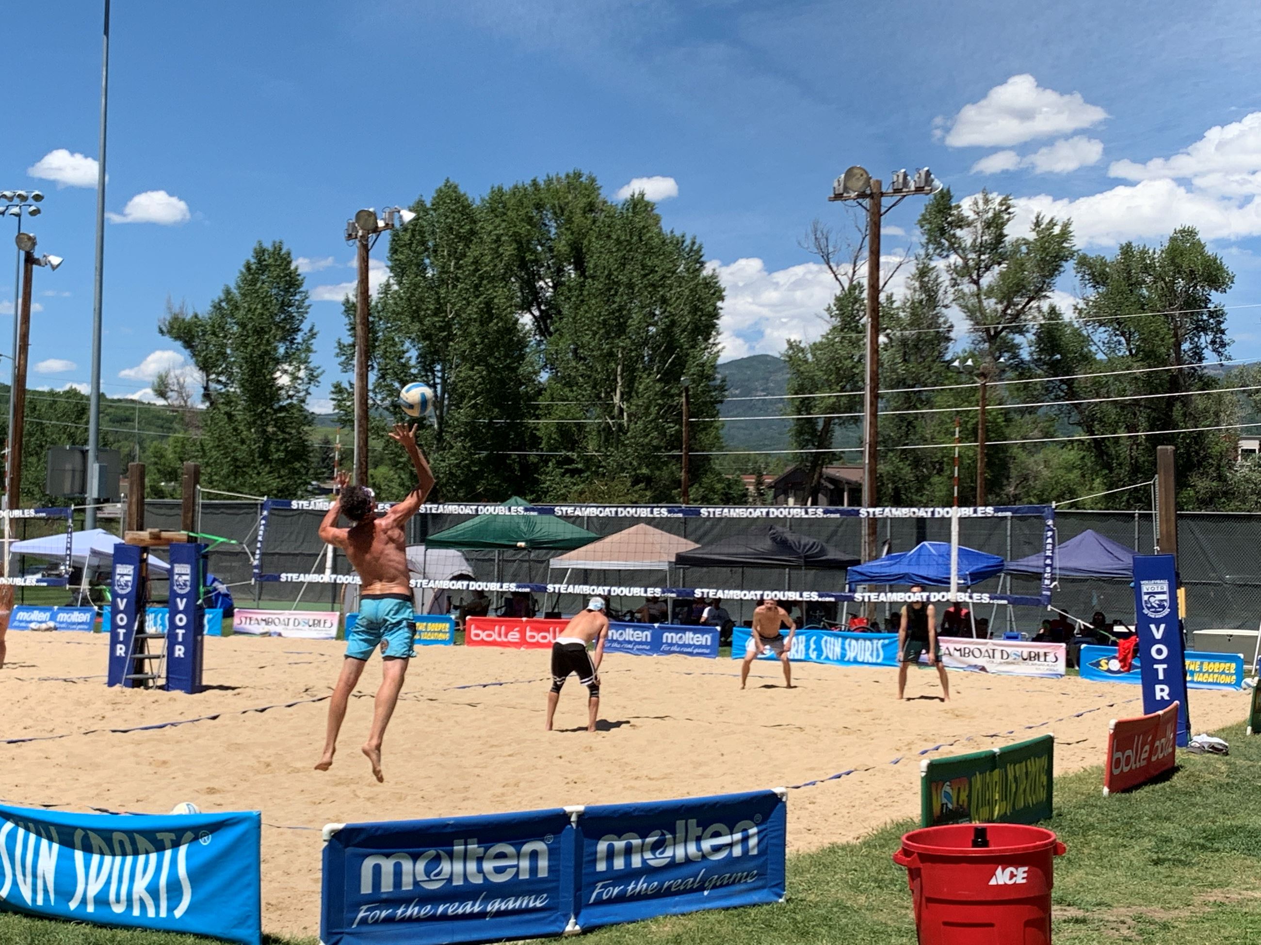 Sand volleyball game in summer