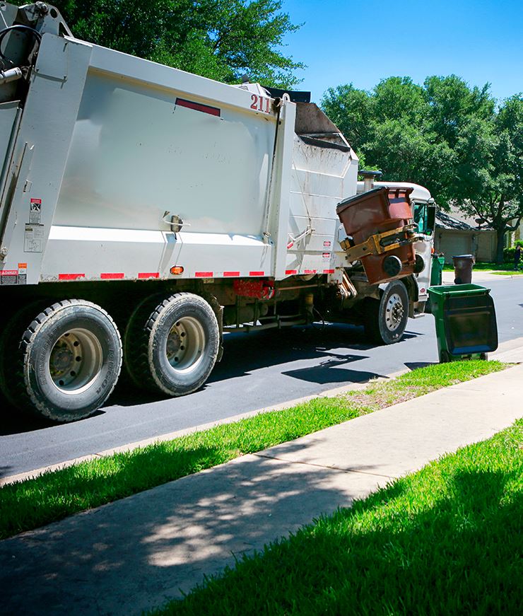 Trash truck pick up curbside container