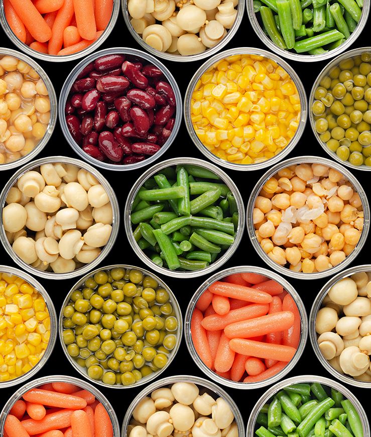 Cans of open vegetables